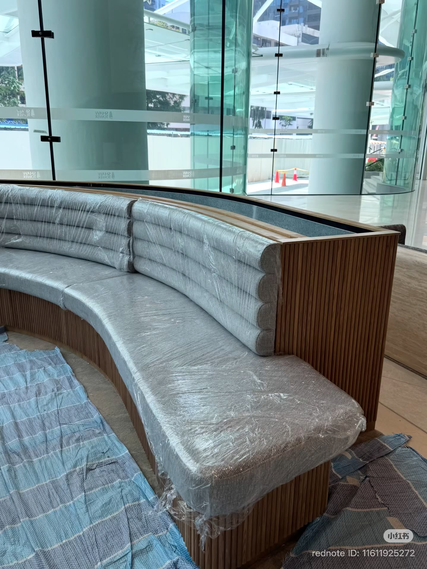 Shaw Tower lobby curved settee during installation